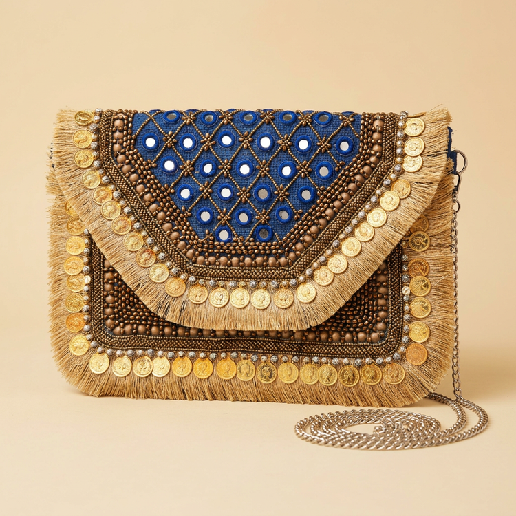 Royal blue mirror and coin fringe clutch, AI-generated studio image
