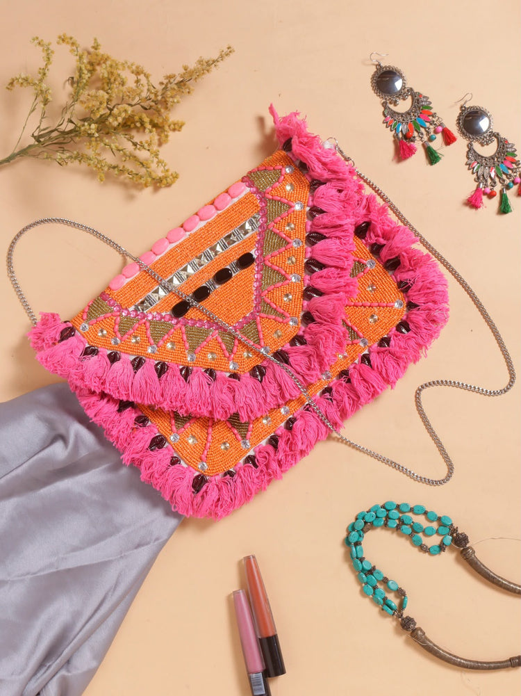 Original Mango Fiesta orange beaded bag with hot-pink tassels