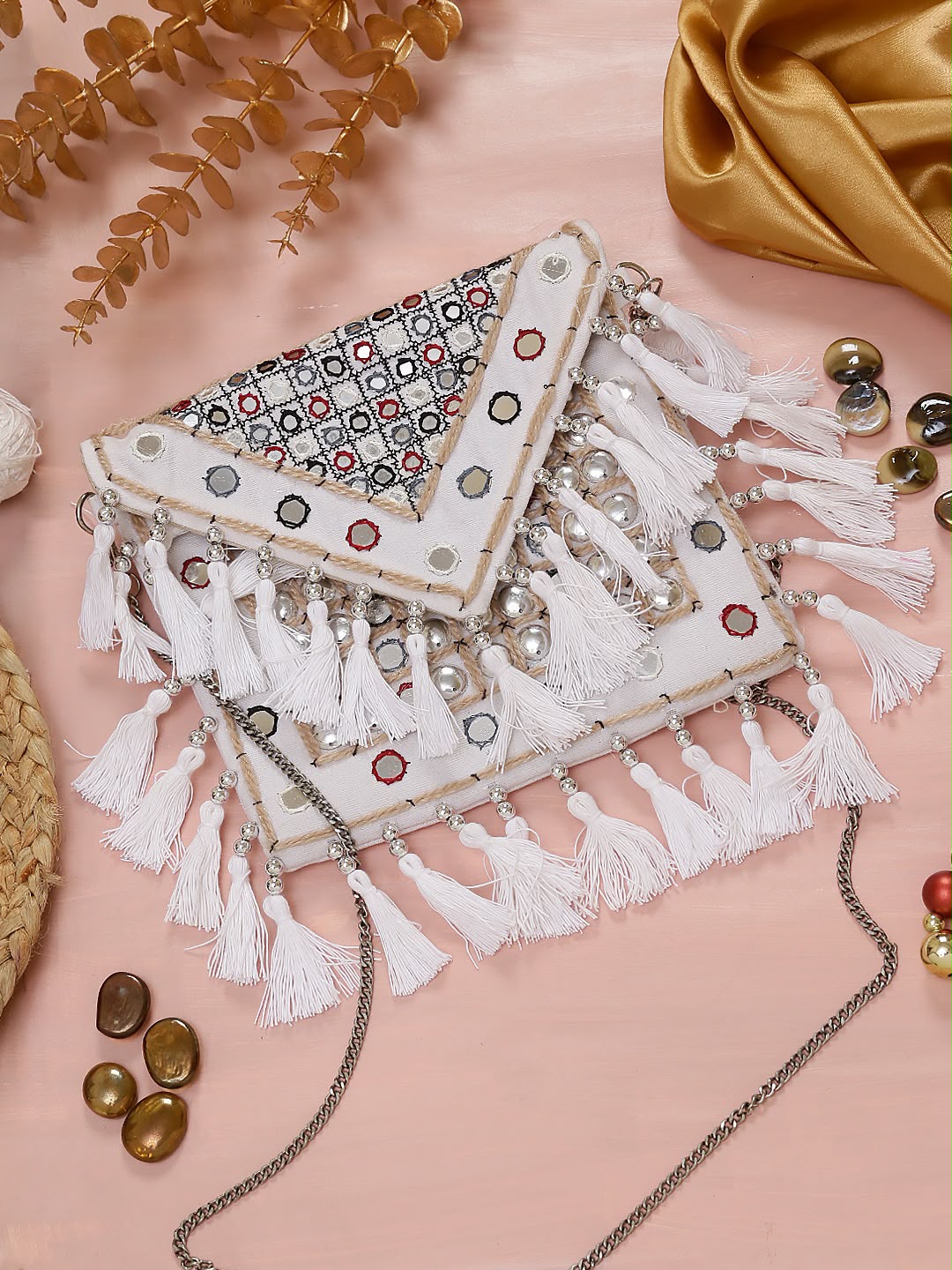 Ivory boho envelope bag with embroidered mirror accents, white tassels and a silver-tone chain