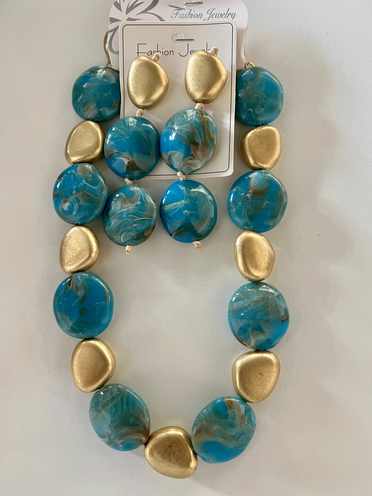 Original blue marbled necklace and matching gold-top two-drop earrings set