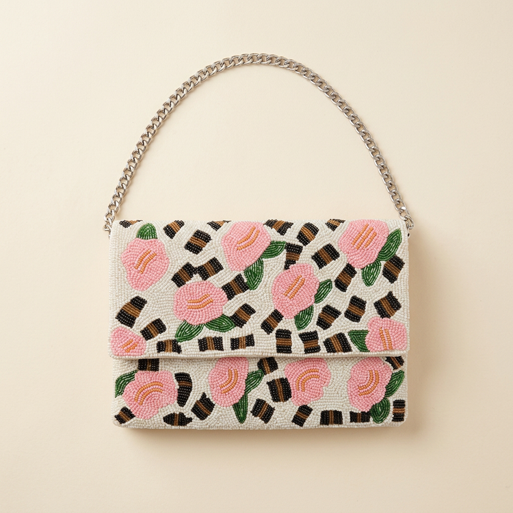 Rosalie pink rose beaded bag on cream studio background