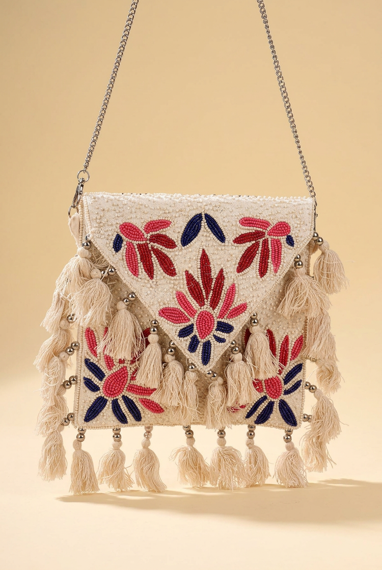 Petal Parade ivory floral beaded tassel bag, studio