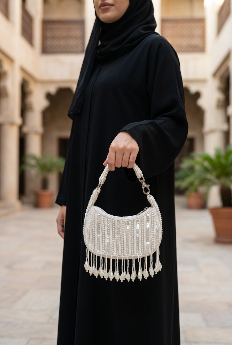 Pearl Rhythm Ivory, black abaya styling