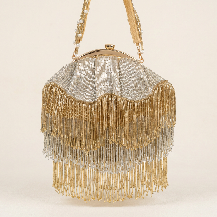 Gold and silver tiered fringe evening bag, studio view
