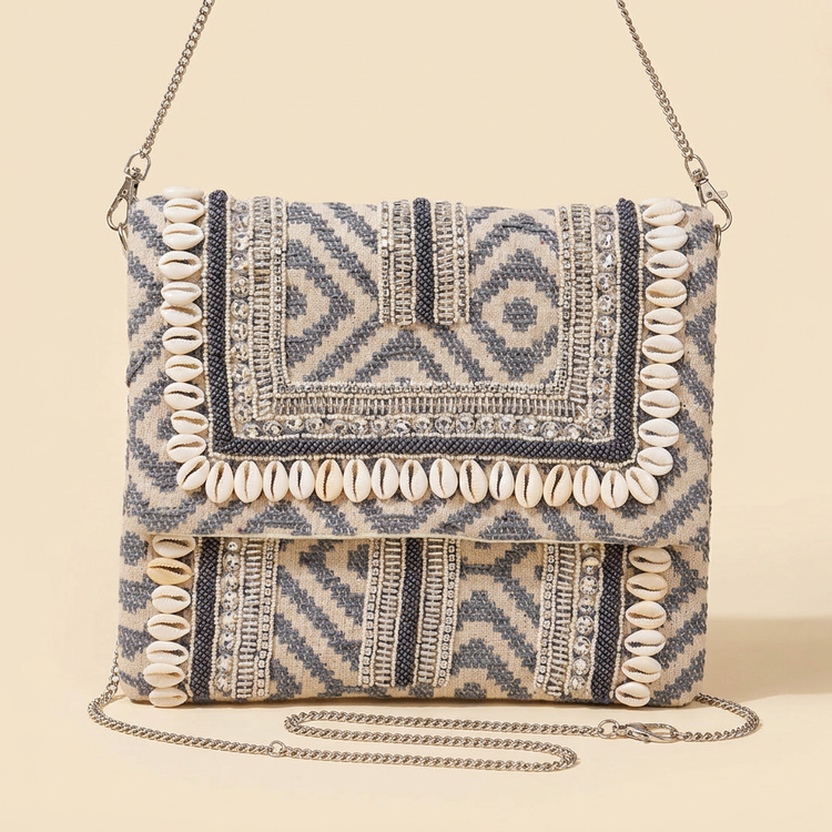 Cove shell-trim boho bag on cream studio background