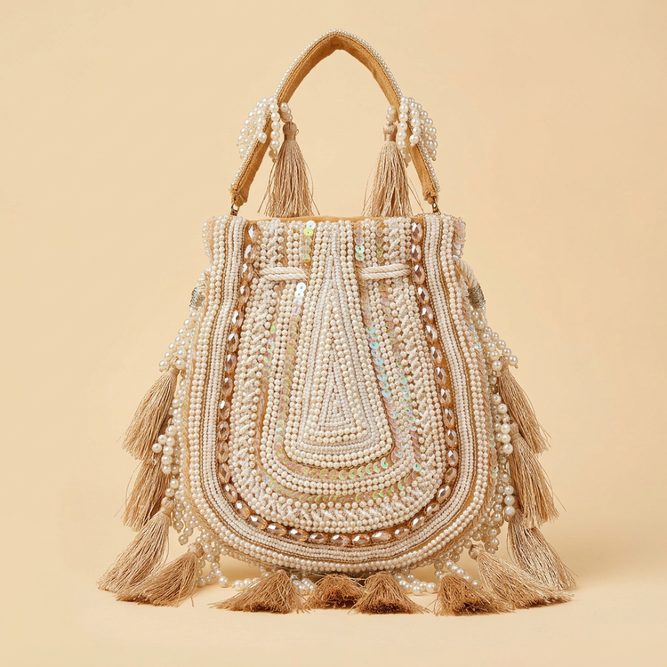 Ivory pearl and champagne tassel boho bag, AI-generated studio image