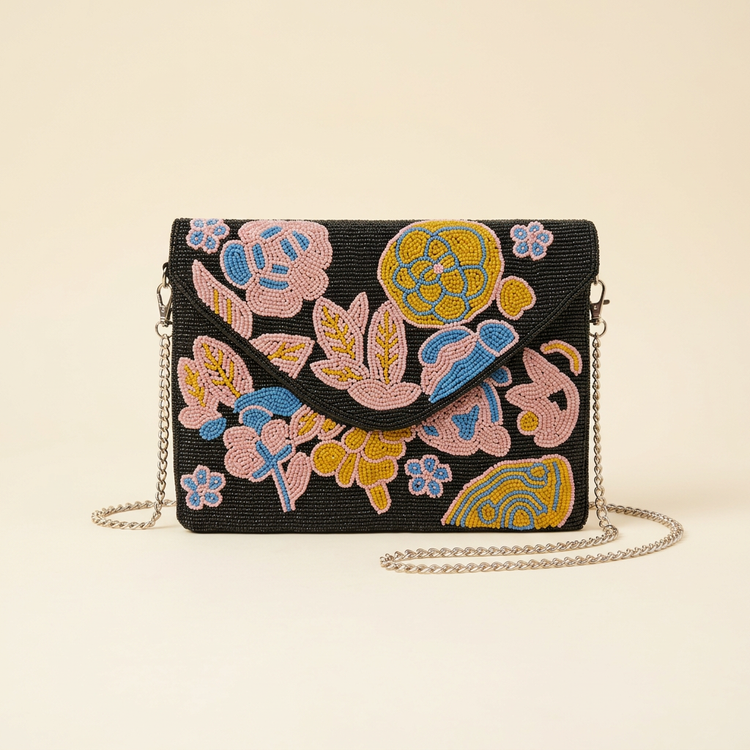 Noor black pastel floral beaded bag on cream studio background