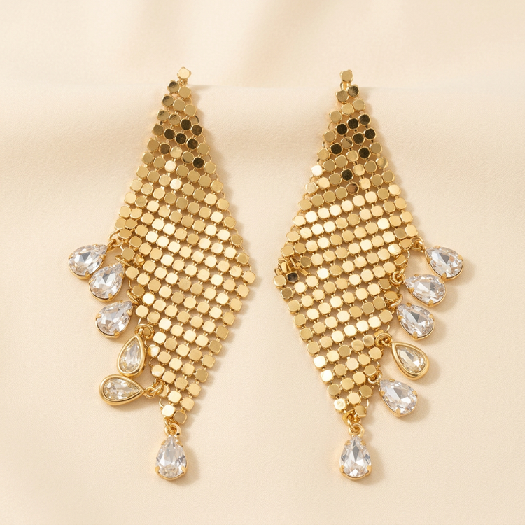 Gold Mesh Crystal Fringe Drop Earrings studio shot on cream