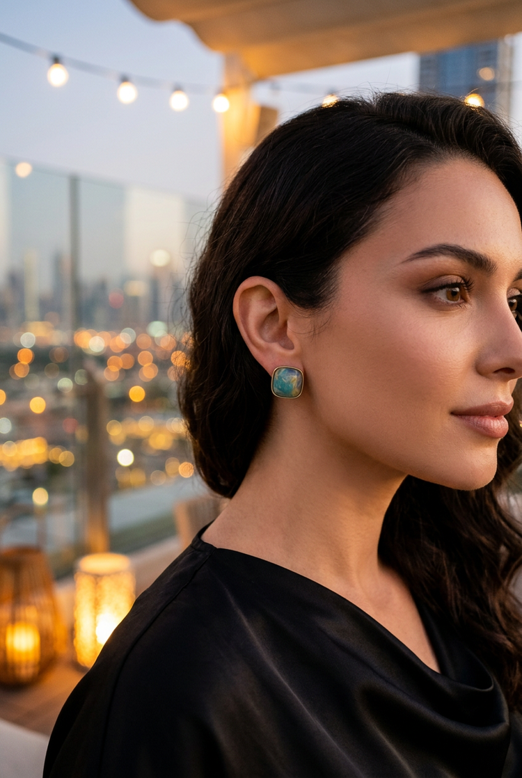 Small teal marbled studs worn in the evening