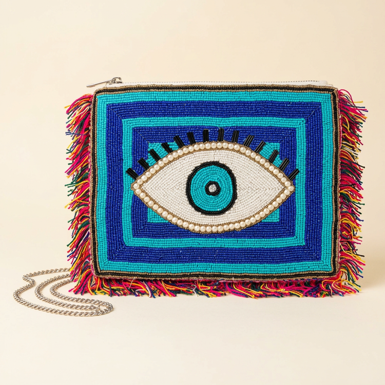 Blue and turquoise beaded eye fringe clutch, AI-generated studio image
