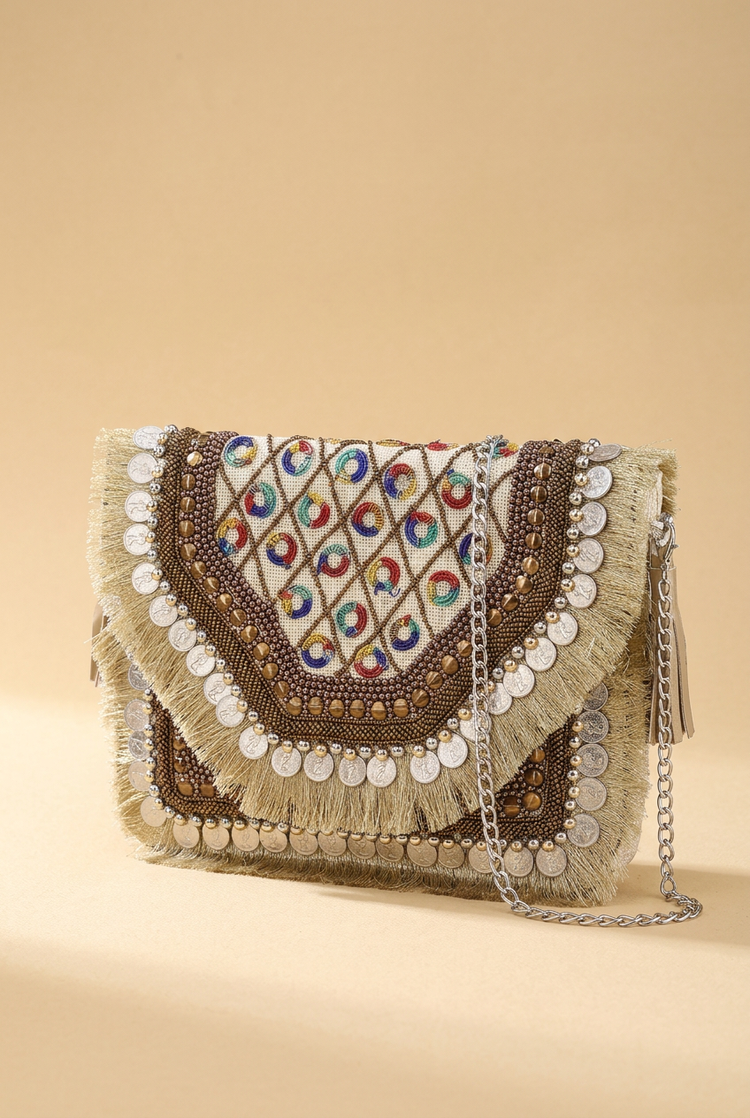 Golden Carnival coin and fringe envelope clutch, studio