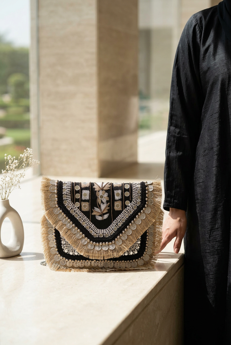 Moonlit Petal bag styled with black abaya