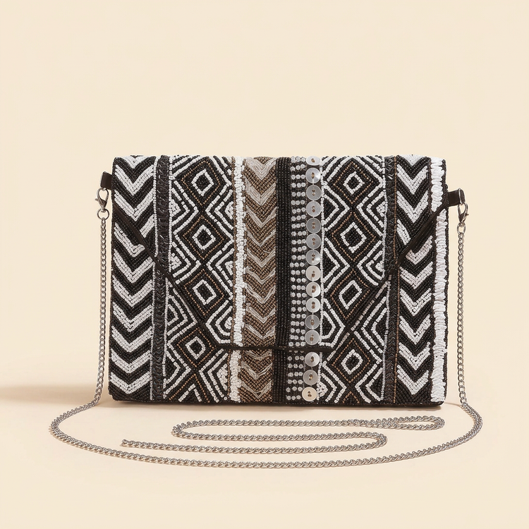 Monochrome Muse geometric beaded bag on cream studio background