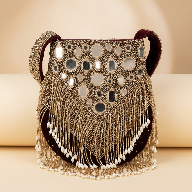 Burgundy mirror and beaded fringe shoulder bag, studio view
