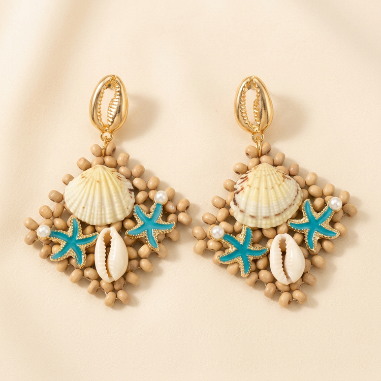 Seashell & Starfish Beaded Earrings studio shot on cream