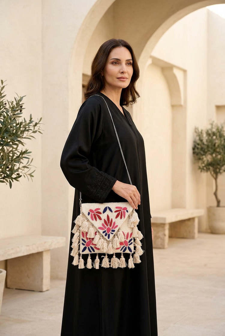 Petal Parade bag styled with black abaya