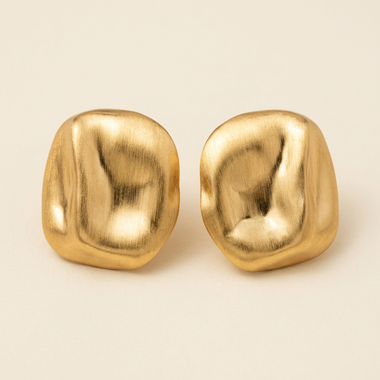 Sculpted gold-tone rounded-square stud earrings, studio view