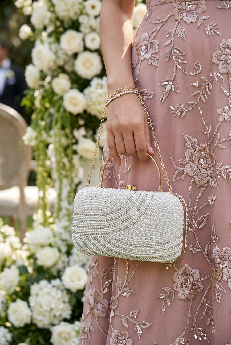 Satin Current Silver wave beaded clutch at a wedding