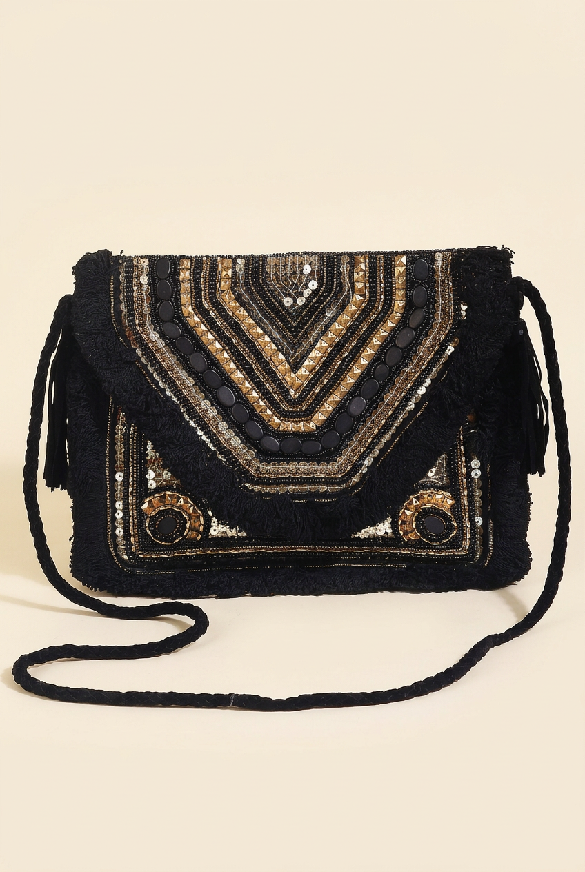 Black Chevron clutch with black braided fabric strap, studio