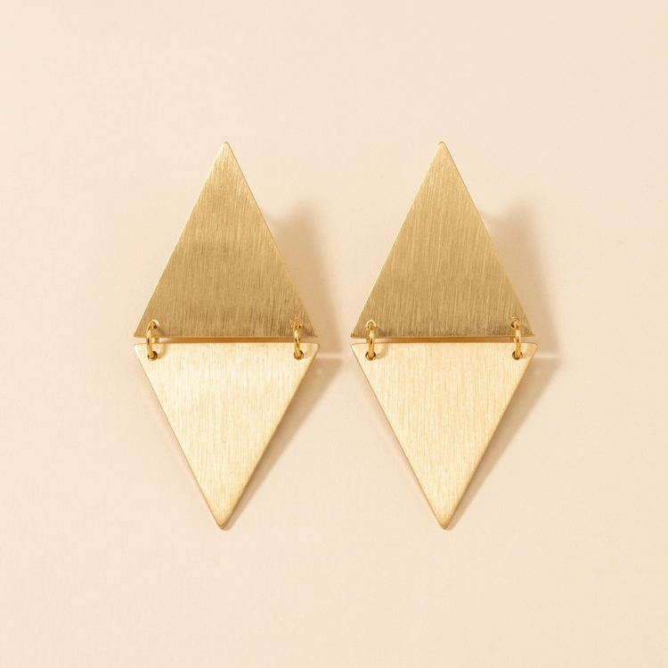 Brushed Gold Hinged Diamond Earrings studio shot on cream