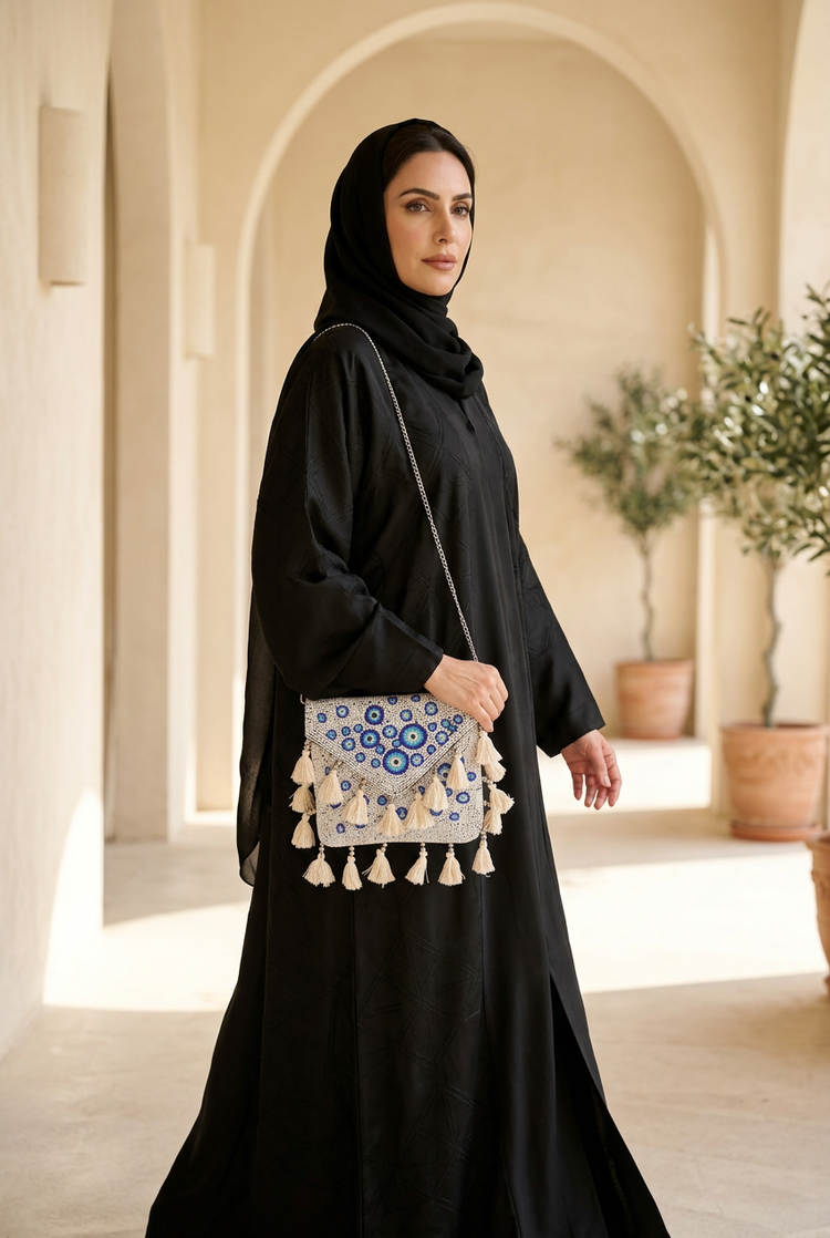 Lucky Eye bag styled with black abaya