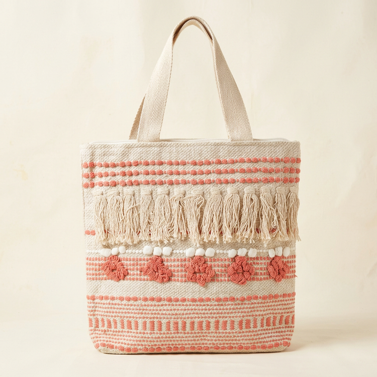Cream and coral floral fringe woven tote, studio image