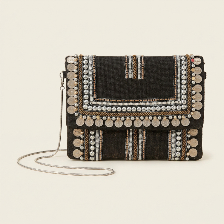 Black stud and coin trim boho clutch, AI-generated studio image