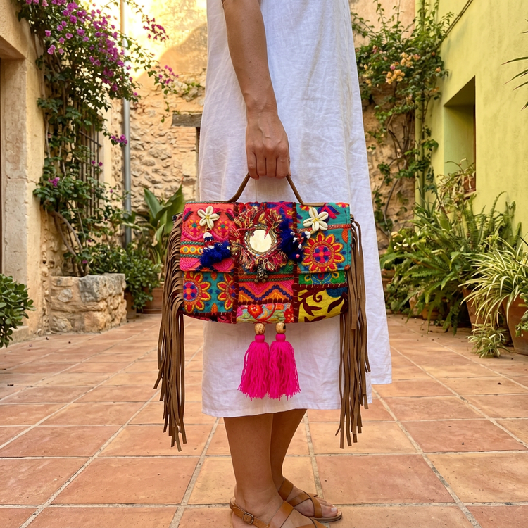 Patchwork boho bag styled with white linen, AI-generated lifestyle image