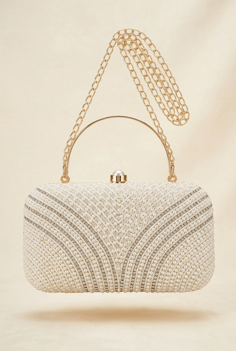 Pearl Arches ivory beaded top-handle clutch, studio