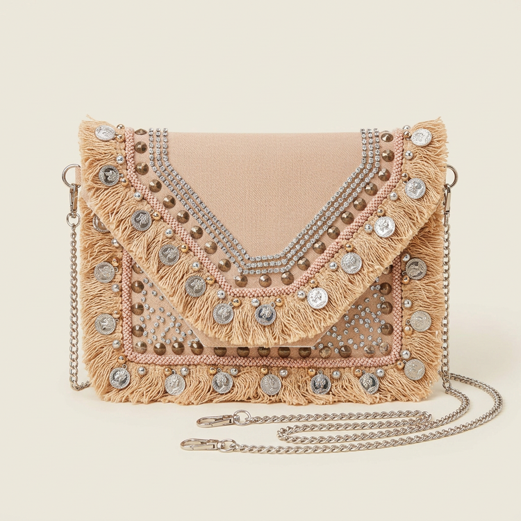 Blush beige coin and fringe clutch, AI-generated studio image