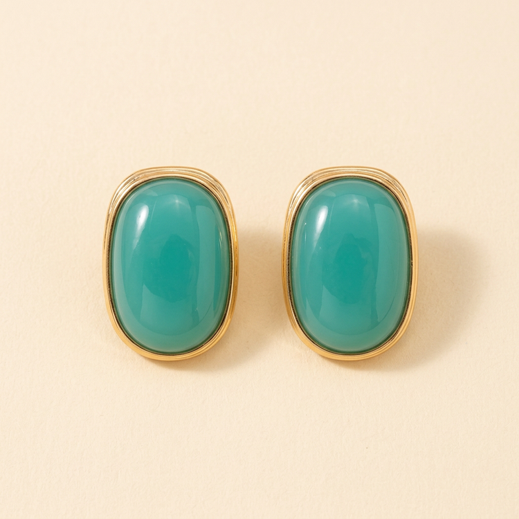 Aqua Oval Gold Bezel Studs studio shot on cream