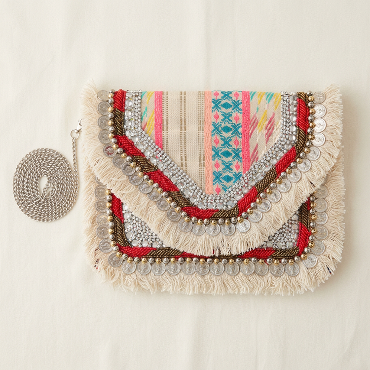 Multicolour woven coin ivory fringe clutch, AI-generated studio image