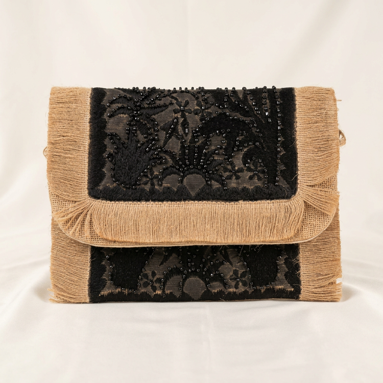 Black and beige floral sequin fringe clutch, studio image