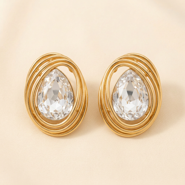 Crystal Swirl Gold Studs studio shot on cream