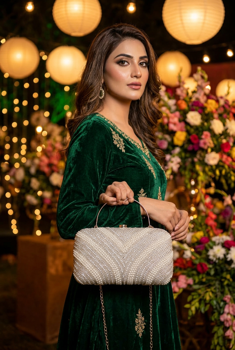 Pearl Contour Silver clutch at a festive celebration