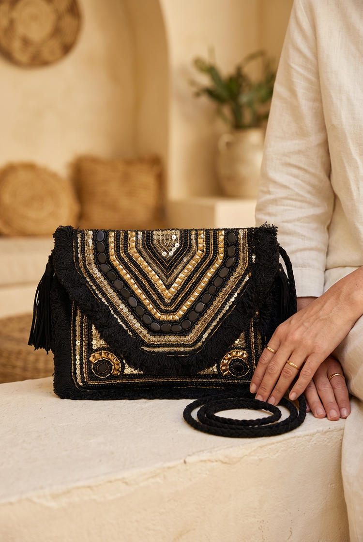 Black Chevron clutch with black fabric strap styled with ivory linen