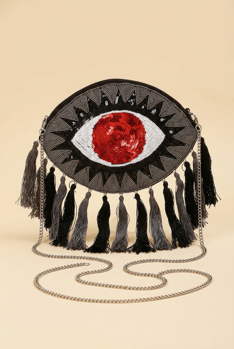 Scarlet Gaze red-eye beaded tassel bag, studio