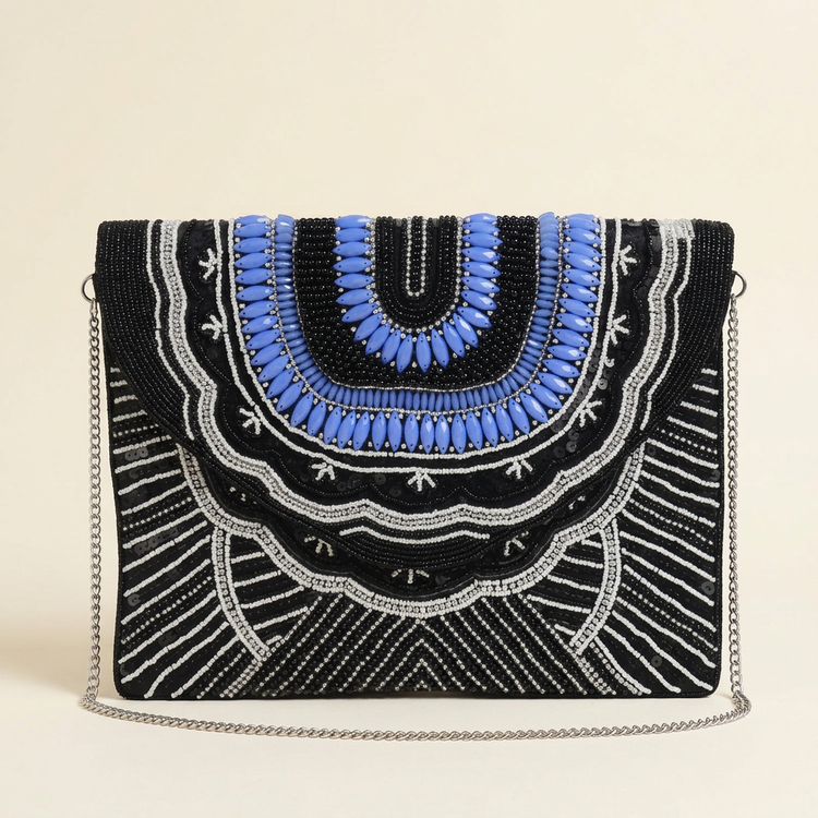 Indira blue and silver beaded bag on cream studio background